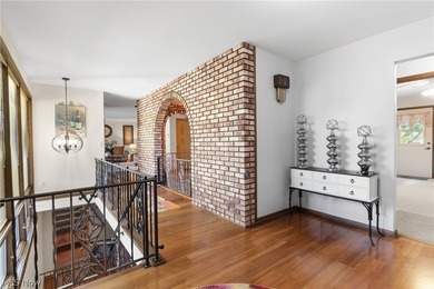 This sprawling 5,300 sq ft brick ranch blends timeless