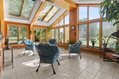 This sprawling 5,300 sq ft brick ranch blends timeless