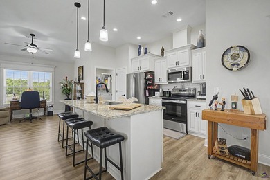 Welcome home to easy living and resort-style amenities in this - photo 21