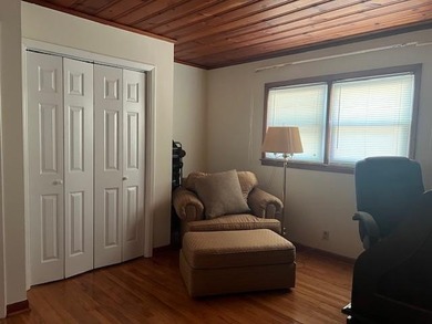 This well maintained 4 BR, 2 BA home is located just inside the - photo 11