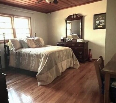 This well maintained 4 BR, 2 BA home is located just inside the - photo 12