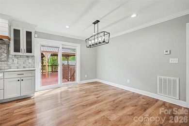 FABULOUS RENOVATION in this classic split-level home overlooking - photo 12