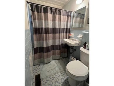 This well maintained 4 BR, 2 BA home is located just inside the - photo 14