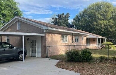 This well maintained 4 BR, 2 BA home is located just inside the - photo 16