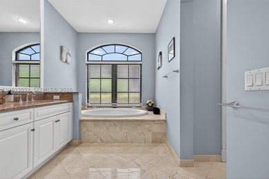 Experience luxury living in the prestigious Parkland Golf & - photo 29