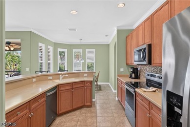 Maintenance-free living meets an unbeatable location in this - photo 3