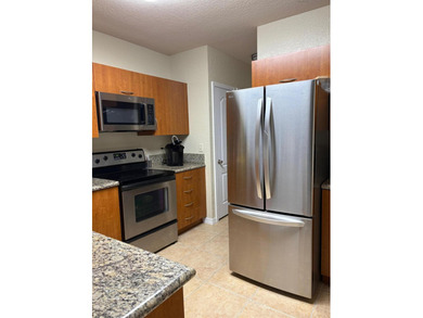Move-in ready and beautifully updated 2 bedroom, 2 bath end-unit - photo 15