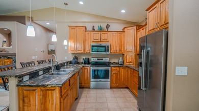 Live by Crystal Lake year-round in this 2010 ranch-style home - photo 6