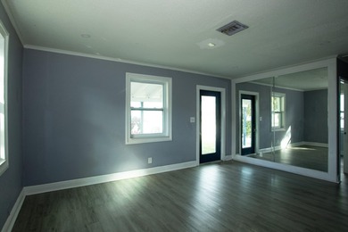 Home is move-in ready! This spacious 4-bedroom, 2-bath - photo 5