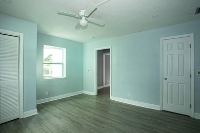 Home is move-in ready! This spacious 4-bedroom, 2-bath - photo 8