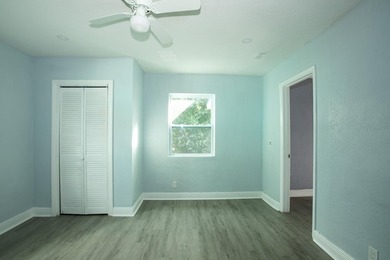 Home is move-in ready! This spacious 4-bedroom, 2-bath - photo 9