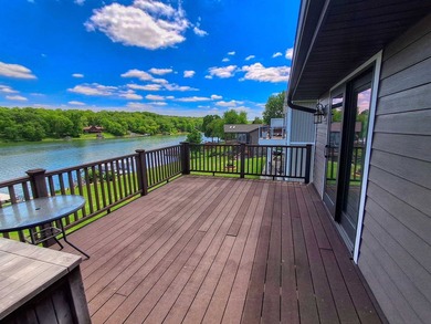 Lake life just got an upgrade. This remodeled waterfront home at - photo 11