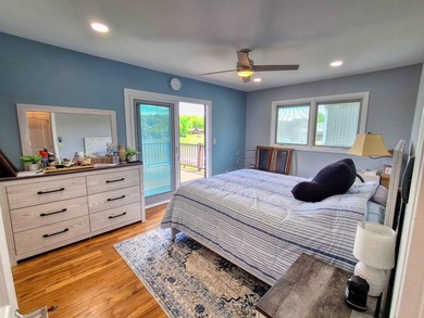 Lake life just got an upgrade. This remodeled waterfront home at - photo 12