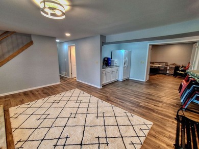 Lake life just got an upgrade. This remodeled waterfront home at - photo 20