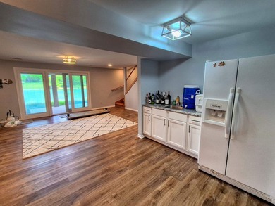Lake life just got an upgrade. This remodeled waterfront home at - photo 21
