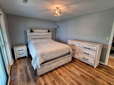 Lake life just got an upgrade. This remodeled waterfront home at - photo 22