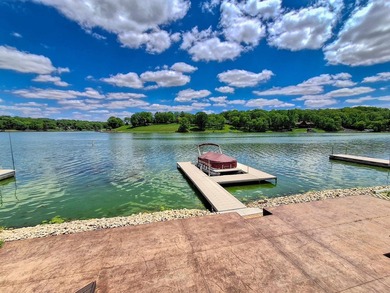 Lake life just got an upgrade. This remodeled waterfront home at - photo 29