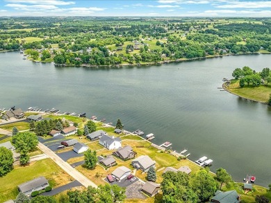 Lake life just got an upgrade. This remodeled waterfront home at - photo 34
