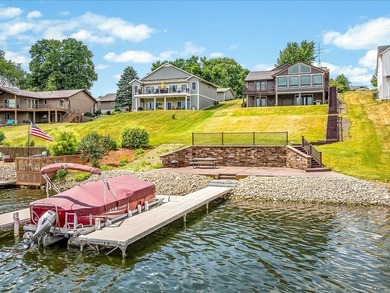 Lake life just got an upgrade. This remodeled waterfront home at - photo 39