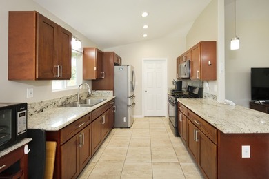 Nestled on a landscaped 1-acre lot, located just off Makuu Dr in - photo 3