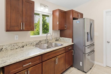Nestled on a landscaped 1-acre lot, located just off Makuu Dr in - photo 5