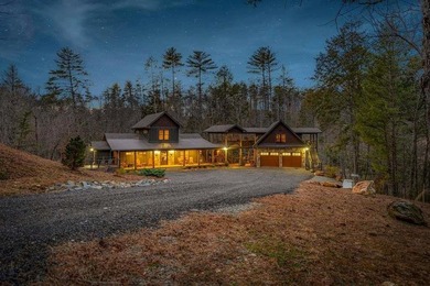Set on 8.5 pristine acres, this extraordinary custom-built cabin