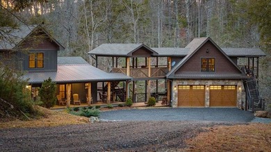 Set on 8.5 pristine acres, this extraordinary custom-built cabin