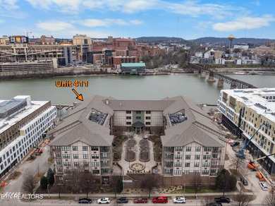 This luxurious waterfront condo overlooks the Tennessee River