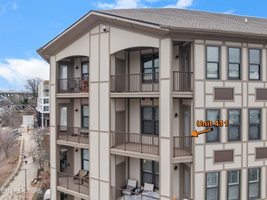 This luxurious waterfront condo overlooks the Tennessee River
