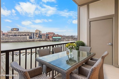 This luxurious waterfront condo overlooks the Tennessee River