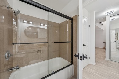 Welcome home to this beautifully updated third-floor end unit