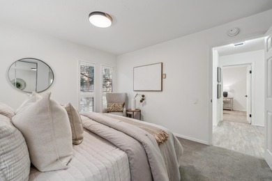 Welcome home to this beautifully updated third-floor end unit