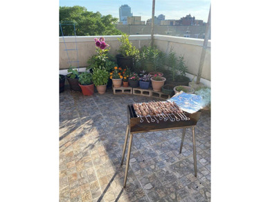 This is a 5 Bedroom 2 Bath Duplex Condo Apt with Roof Top Access - photo 3