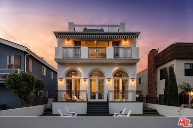 Just two homes in from the sand, this inviting home offers an - photo 2