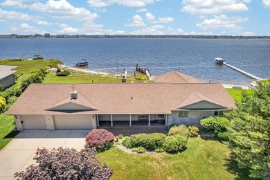 Experience extraordinary waterfront living at 909 Tostenabe Lane - photo 5