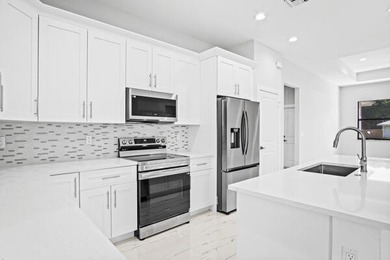 Discover this stunning new construction home that blends luxury - photo 4