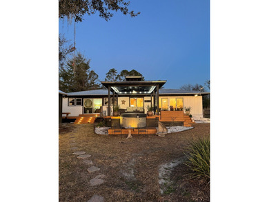 Welcome to this stunning 3-bedroom, 3-bath waterfront home - photo 22