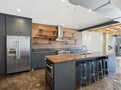 Experience urban living at its finest in this sophisticated