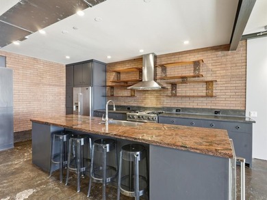 Experience urban living at its finest in this sophisticated