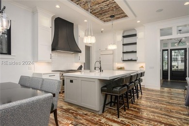 Delight in the welcoming luxury of this four-bedroom - photo 8