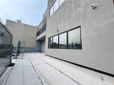 Welcome to 1374 65th Street, a brand-new commercial building in - photo 16