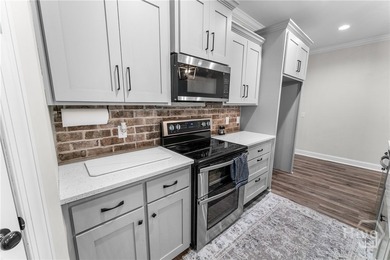 Welcome to this exceptional 5-bedroom, 3-bath home in the highly - photo 15