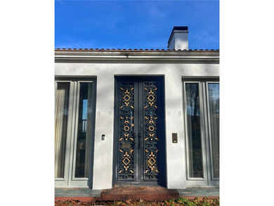 One of Russellville's most iconic homes, this Mediterranean - photo 6