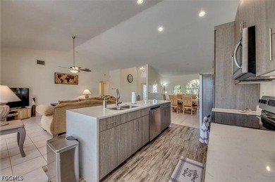 Welcome to this spacious waterfront pool home located in a - photo 6