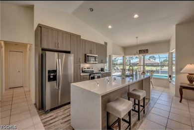 Welcome to this spacious waterfront pool home located in a - photo 7