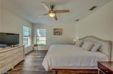 Welcome to this spacious waterfront pool home located in a - photo 8