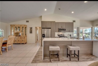 Welcome to this spacious waterfront pool home located in a - photo 9