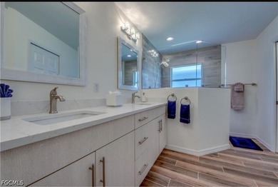 Welcome to this spacious waterfront pool home located in a - photo 10