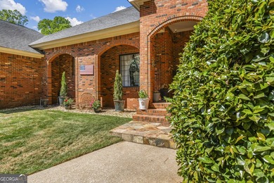 Welcome to this stunning four-sided brick lakefront retreat - photo 2