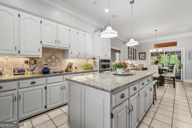 Welcome to this stunning four-sided brick lakefront retreat - photo 7